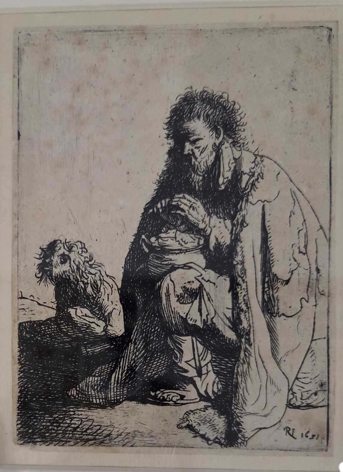 Рембрандт Харменс ван Рейн. Сидящий нищий с собакой, 1631 гравюра резцом и офортом
