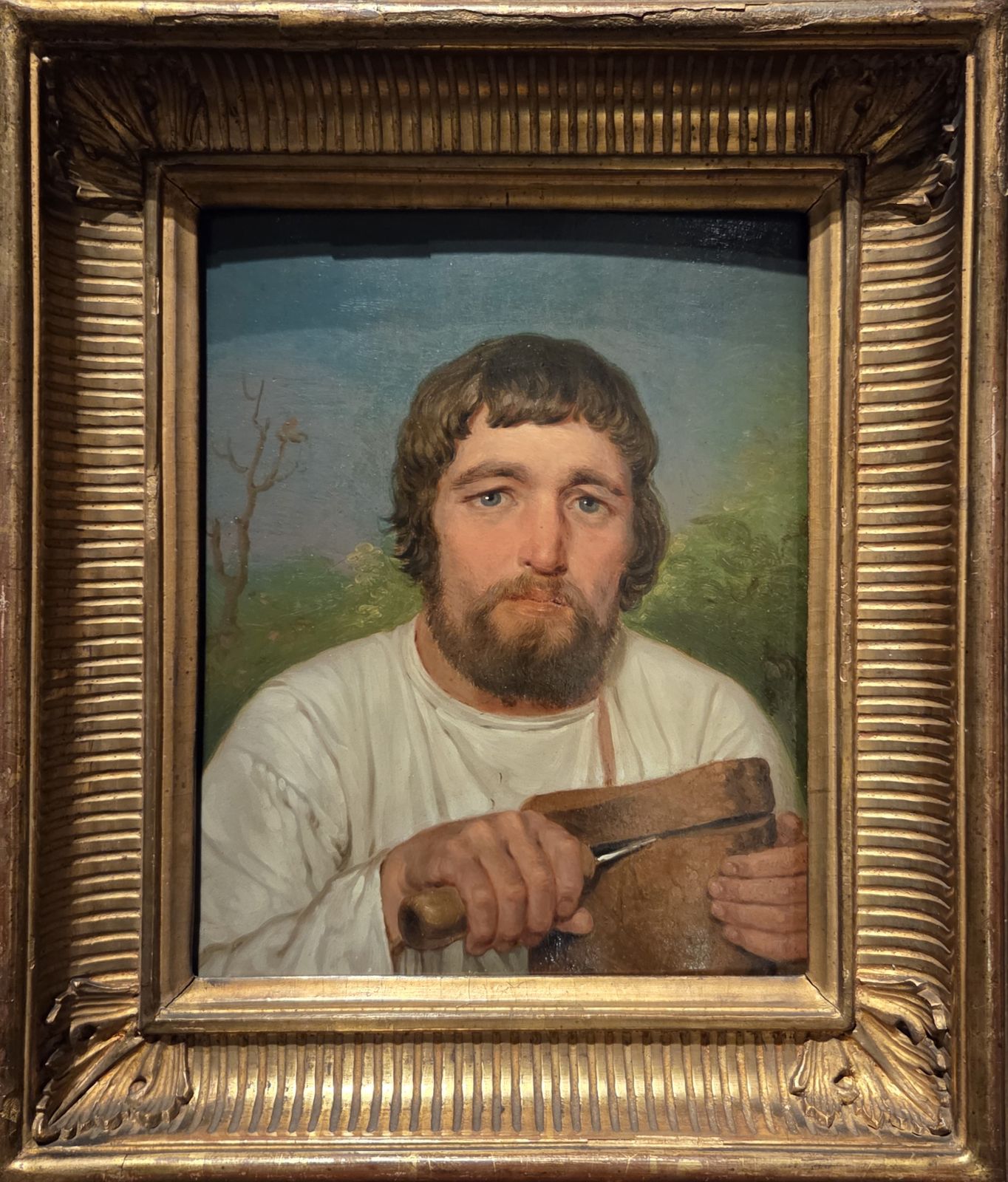 Алексей Венецианов. Крестьянин, отрезающий ломоть хлеба. 1820-е дерево, масло